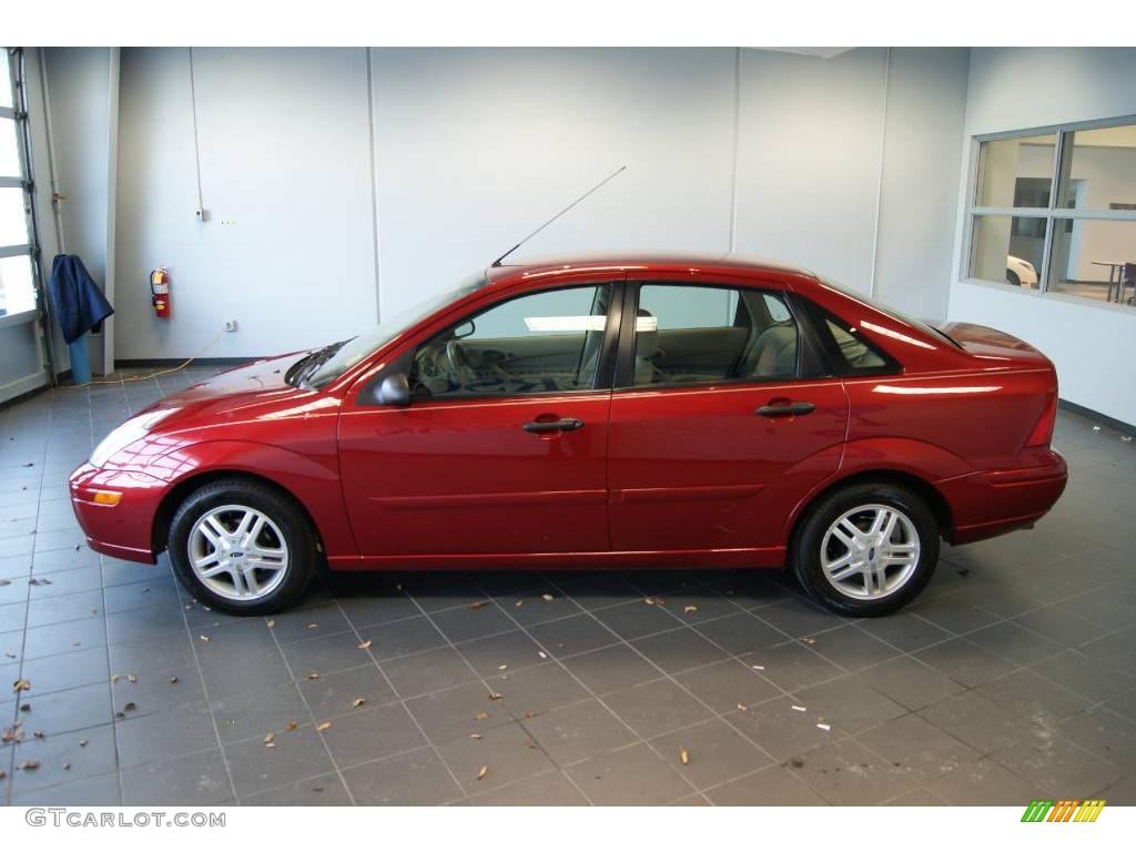 2000 Focus SE Sedan - Sangria Red Metallic / Medium Parchment photo #6