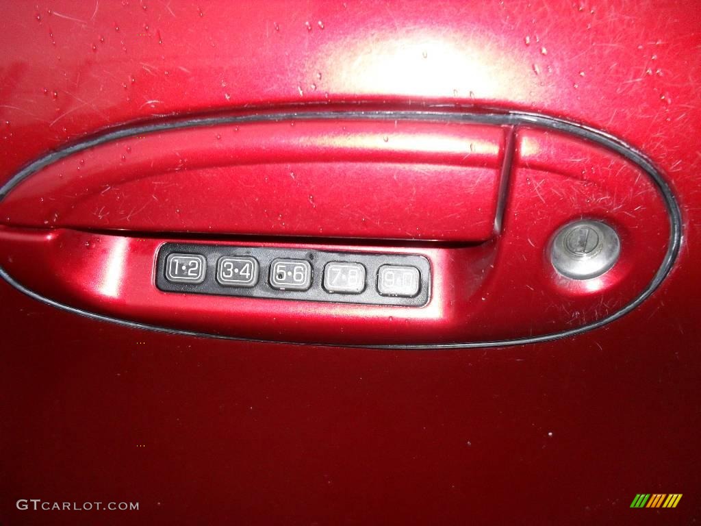 2000 Taurus SEL - Toreador Red Metallic / Medium Graphite photo #19