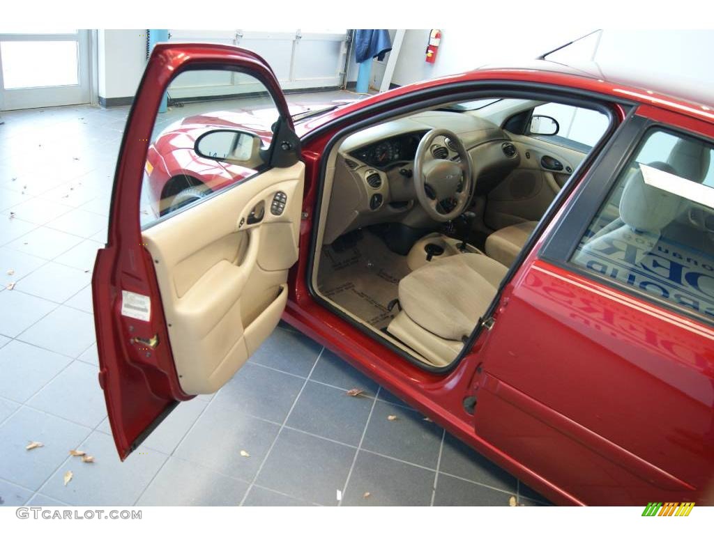 2000 Focus SE Sedan - Sangria Red Metallic / Medium Parchment photo #20