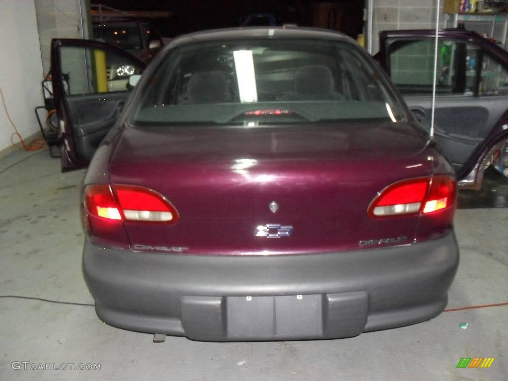 1995 Cavalier Sedan - Dark Cherry Metallic / Gray photo #4
