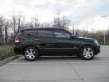 2009 Ebony Black Kia Borrego EX V8 4x4  photo #4