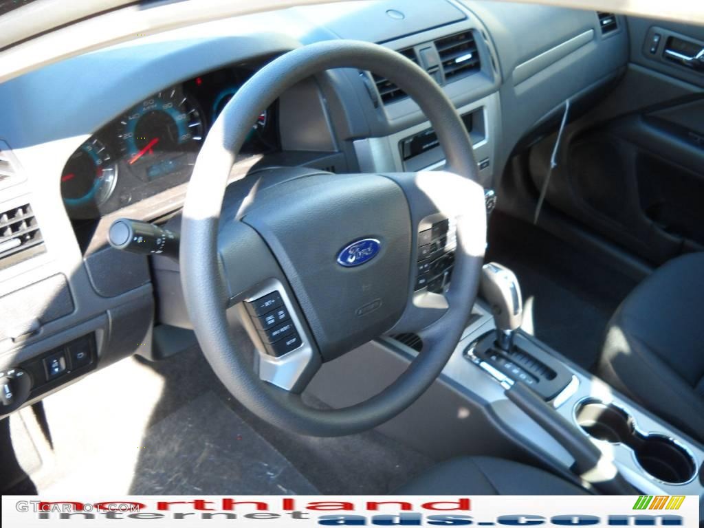 2010 Fusion SE - Tuxedo Black Metallic / Medium Light Stone photo #10