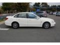 Cream White - L Series L200 Sedan Photo No. 2