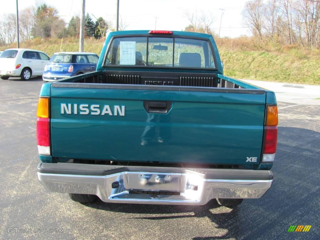 1997 Hardbody Truck XE Regular Cab 4x4 - Vivid Teal Pearl Metallic / Dark Gray photo #4