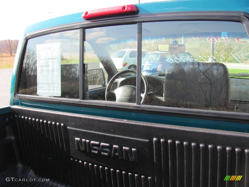 1997 Hardbody Truck XE Regular Cab 4x4 - Vivid Teal Pearl Metallic / Dark Gray photo #8