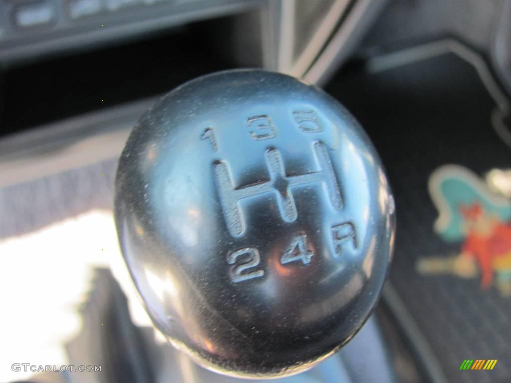1997 Hardbody Truck XE Regular Cab 4x4 - Vivid Teal Pearl Metallic / Dark Gray photo #19