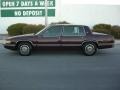 1992 Dark Garnet Red Metallic Cadillac DeVille Sedan  photo #1