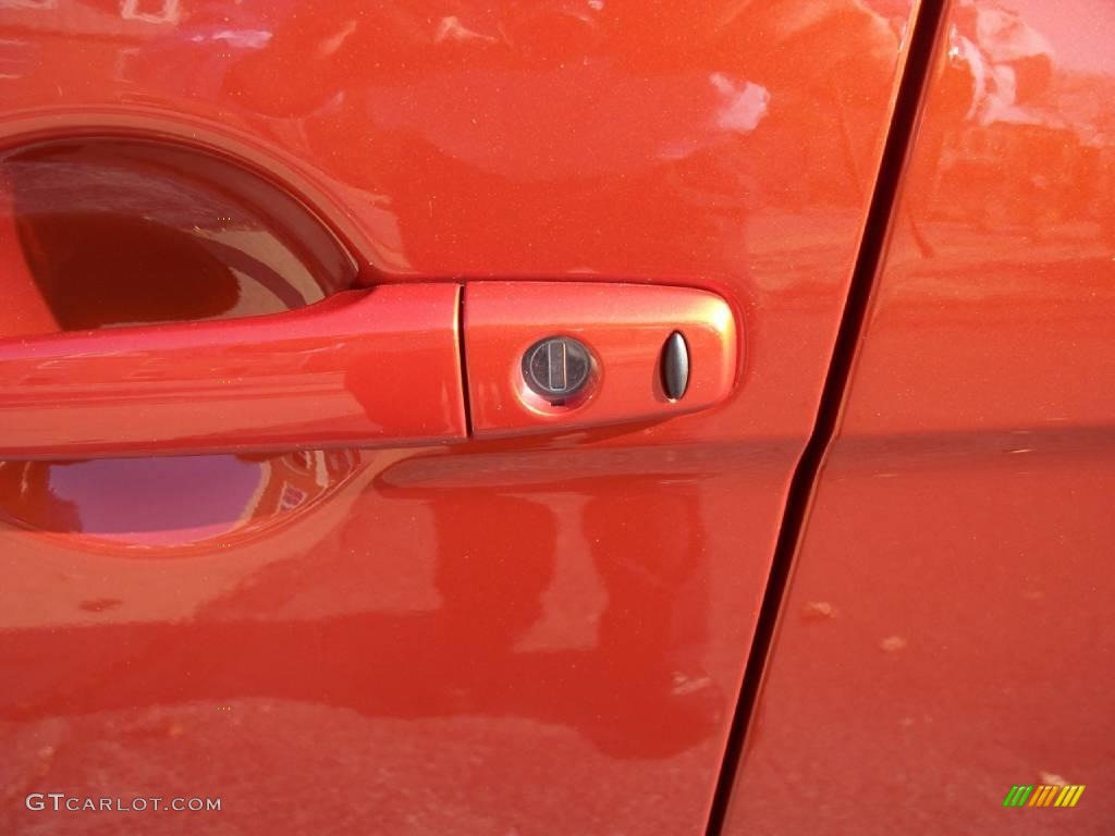 2010 Lancer GTS - Rotor Glow Orange Metallic / Black photo #6