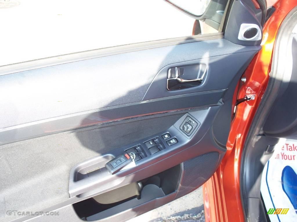 2010 Lancer GTS - Rotor Glow Orange Metallic / Black photo #7