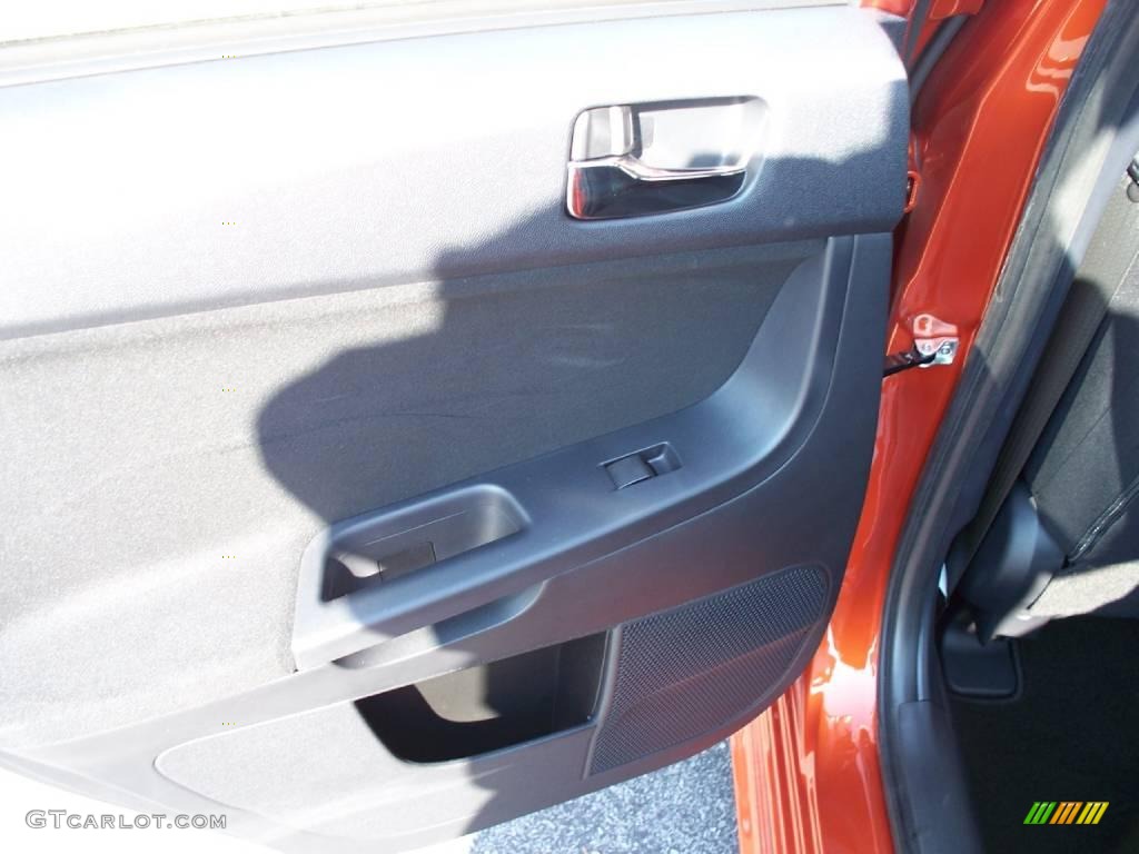 2010 Lancer GTS - Rotor Glow Orange Metallic / Black photo #23