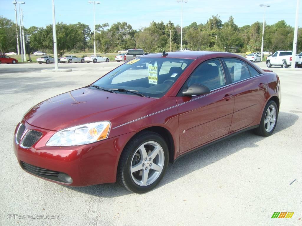 2009 G6 GT Sedan - Performance Red Metallic / Ebony photo #1