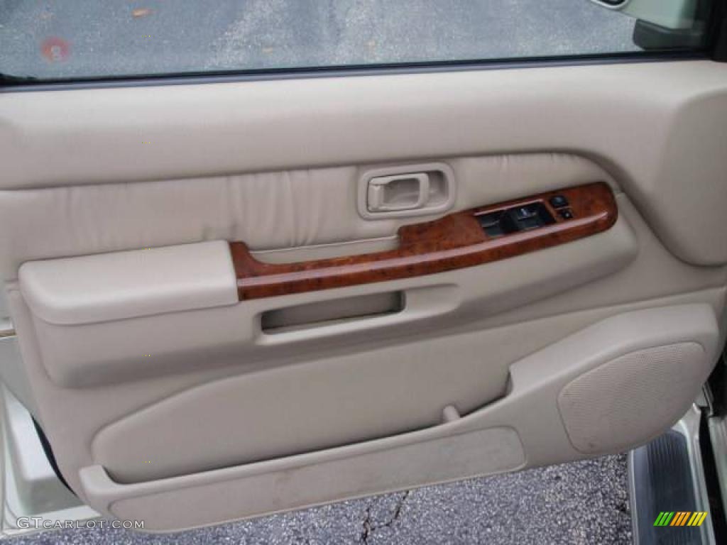 1999 QX4 4x4 - Tuscan Beige Metallic / Beige photo #16