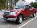 2004 Dark Toreador Red Metallic Ford F150 XLT SuperCab 4x4  photo #1