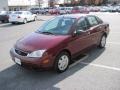 2007 Dark Toreador Red Metallic Ford Focus ZX4 SE Sedan  photo #3