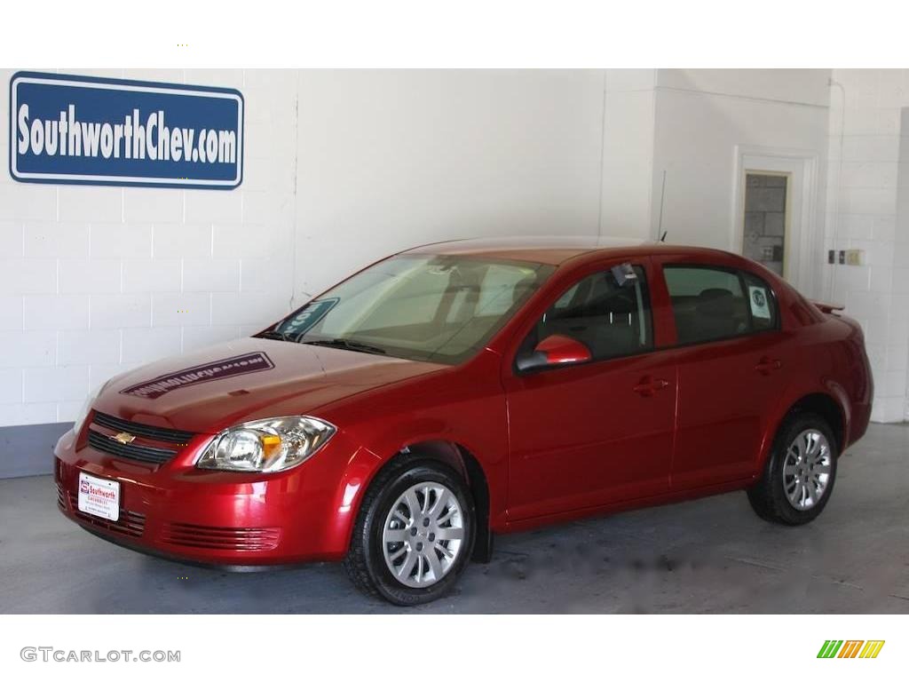 2010 Cobalt LT Sedan - Crystal Red Tintcoat Metallic / Ebony photo #1