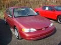 1999 Canyon Red Mica Metallic Chevrolet Prizm   photo #1