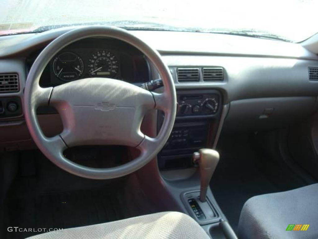 1999 Prizm  - Canyon Red Mica Metallic / Dark Charcoal photo #10