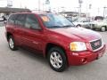 2004 Magnetic Red Metallic GMC Envoy SLE 4x4  photo #1