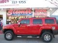 2006 Victory Red Hummer H3   photo #1