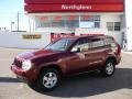 2007 Red Rock Crystal Pearl Jeep Grand Cherokee Laredo 4x4  photo #1