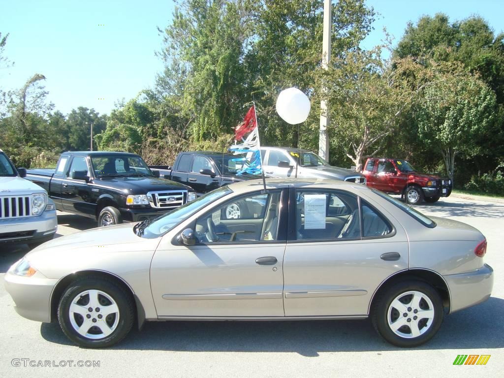 2004 Cavalier LS Sedan - Sandrift Metallic / Neutral photo #2