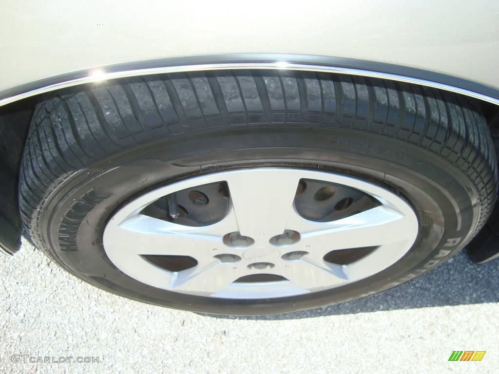 2004 Cavalier LS Sedan - Sandrift Metallic / Neutral photo #13