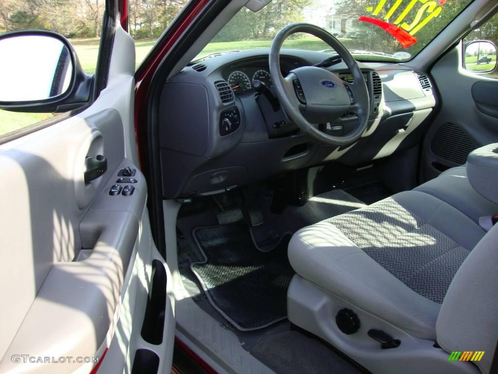 2003 F150 XLT Regular Cab 4x4 - Toreador Red Metallic / Medium Graphite Grey photo #12