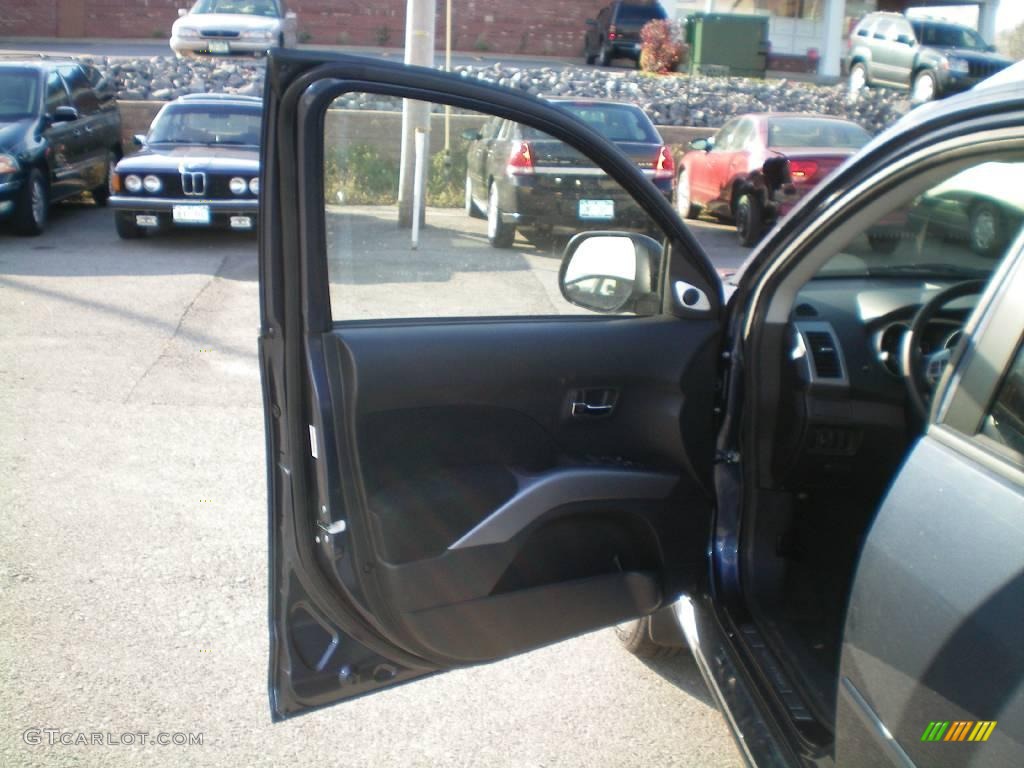 2009 Outlander SE 4WD - Deep Blue Metallic / Black photo #17