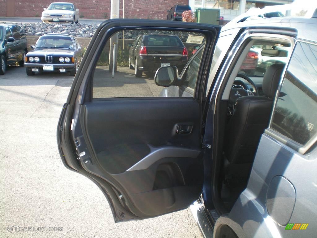 2009 Outlander SE 4WD - Deep Blue Metallic / Black photo #18