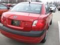 2009 Tropical Red Kia Rio LX Sedan  photo #2