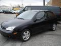 2005 Pitch Black Ford Focus ZX3 SES Coupe  photo #1