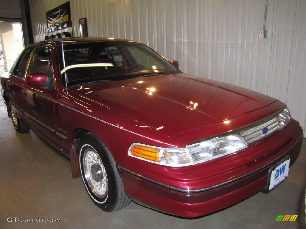 Dark Red Metallic Ford Crown Victoria
