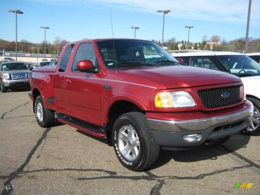 2002 F150 Lariat SuperCab 4x4 - Toreador Red Metallic / Medium Graphite photo #1