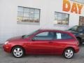 2005 Sangria Red Metallic Ford Focus ZX3 SES Coupe  photo #2