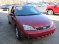 2005 Sangria Red Metallic Ford Focus ZX3 SES Coupe  photo #5