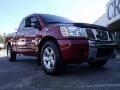 2006 Red Brawn Nissan Titan SE King Cab  photo #2