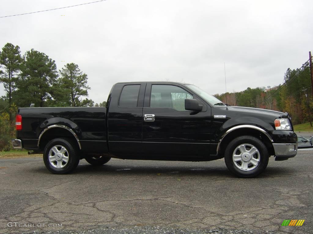 2004 F150 XLT SuperCab - Black / Medium/Dark Flint photo #1