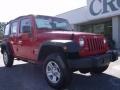 2010 Flame Red Jeep Wrangler Unlimited Sport 4x4  photo #2