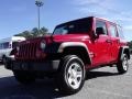 2010 Flame Red Jeep Wrangler Unlimited Sport 4x4  photo #4