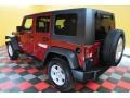 2009 Red Rock Crystal Pearl Jeep Wrangler Unlimited X 4x4  photo #21