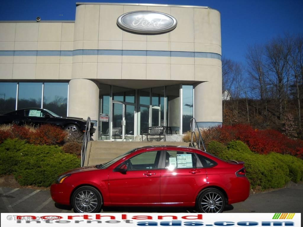 2010 Focus SES Sedan - Sangria Red Metallic / Medium Stone photo #1