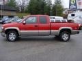 2001 Victory Red Chevrolet Silverado 1500 LS Extended Cab 4x4  photo #3