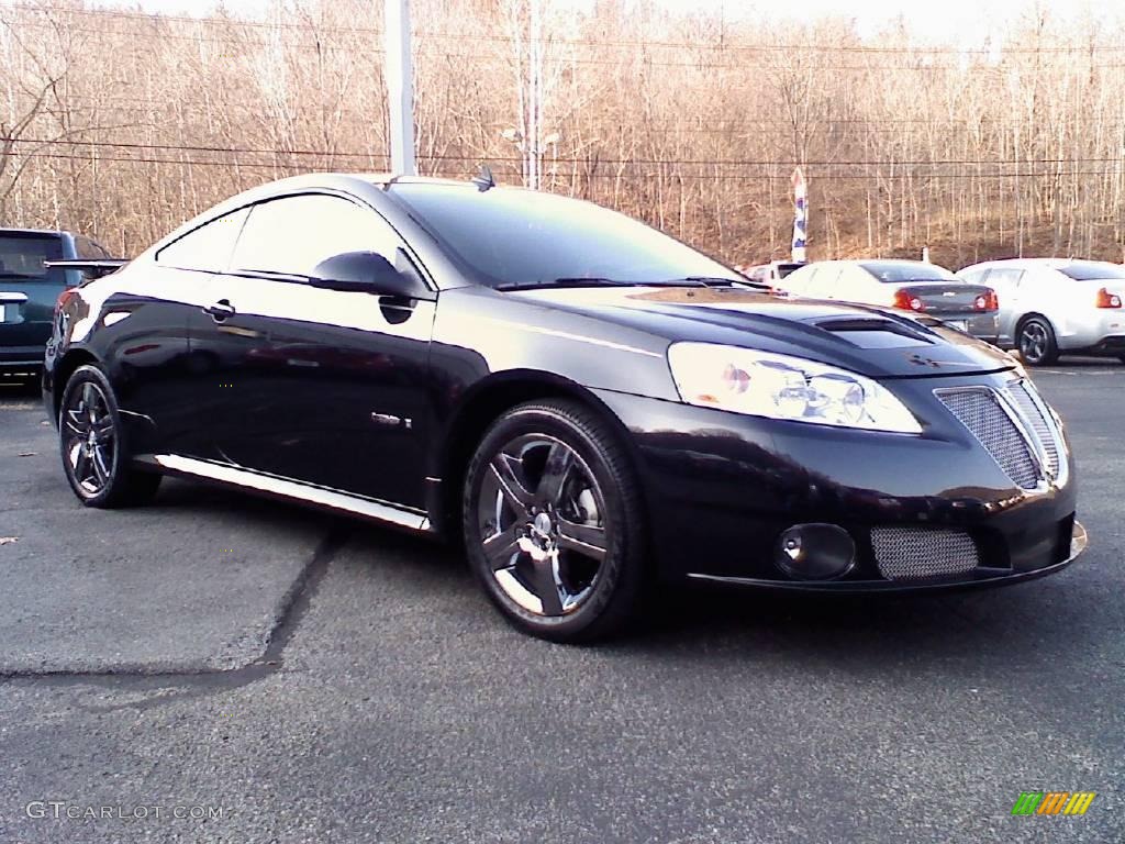 2009 G6 GXP Coupe - Carbon Black Metallic / Ebony/Light Titanium photo #1