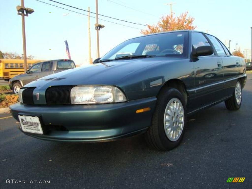 1997 Achieva SL Sedan - Medium Sea Green Metallic / Blue photo #1