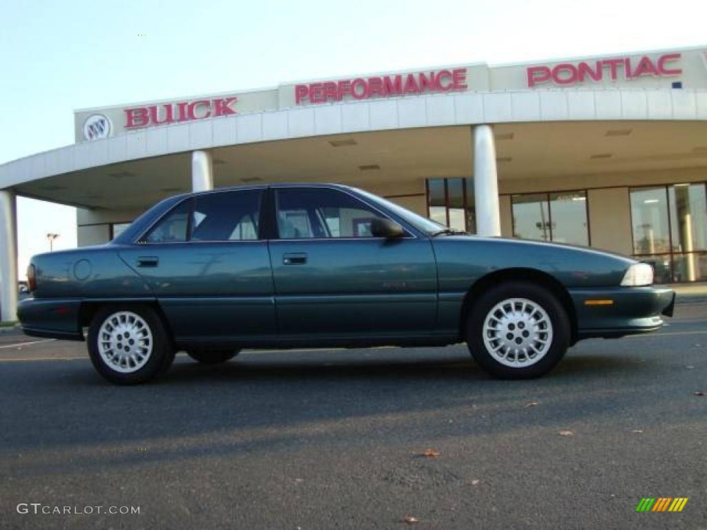 1997 Achieva SL Sedan - Medium Sea Green Metallic / Blue photo #6