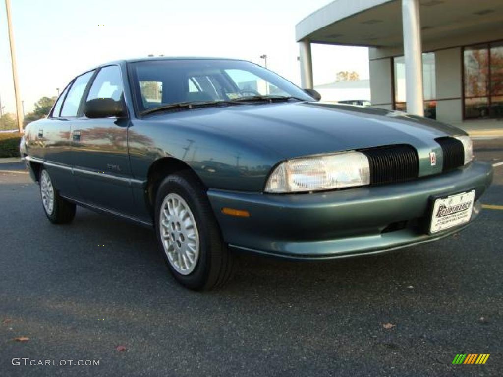 1997 Achieva SL Sedan - Medium Sea Green Metallic / Blue photo #7