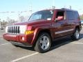2009 Red Rock Crystal Pearl Jeep Commander Limited 4x4  photo #1