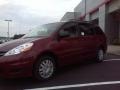 2010 Salsa Red Pearl Toyota Sienna LE  photo #3