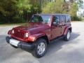 2010 Red Rock Crystal Pearl Jeep Wrangler Unlimited Sahara 4x4  photo #1