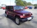 2010 Red Rock Crystal Pearl Jeep Wrangler Unlimited Sahara 4x4  photo #3